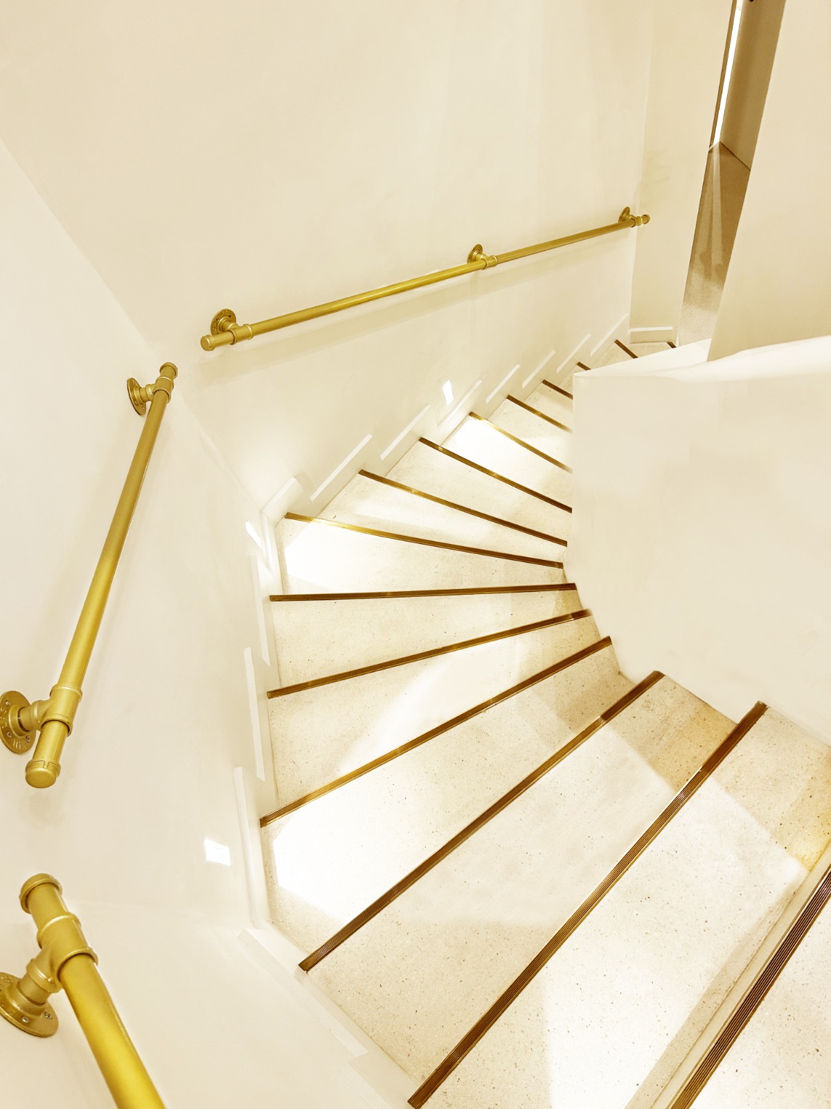 Combray, brass staircase detail